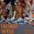 [Image description: An image of many feet, wearing sneakers, running on pavement. Some legs are visible from the knee down. Some of the legs are blurred from movement. At the bottom of the photo orange text reads, “KODA Family Fun Night" and "KODAheart #k3family".]