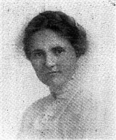 [Image Description: A black and white newspaper image of a young white woman, wearing early twentieth century, white shirt Her hair, in a braid, is piled atop her head. She looks out from the photograph with a serious expression.]