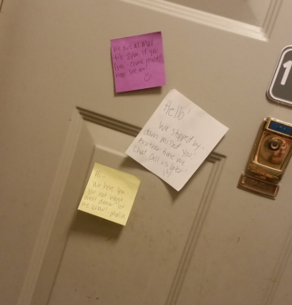  [Image Description:An image of part of a front door with three different colored notes with hand written messages attached to the door. The first one, purple, reads “Hi we are at the mall until 2pm, if free come meet. Hope to see you!” It is signed with a smiley face. The second note is white and says “Hello! We stopped by- darn missed you! Another time we chat. Call us later!” Signed with an ILY sign. The last note is yellow and reads “Hi- we here 1pm- you not. Want meet dinner? Let me know!” Signed with the name Malia. To the right of all the notes is a gold door knocker with a peephole.]