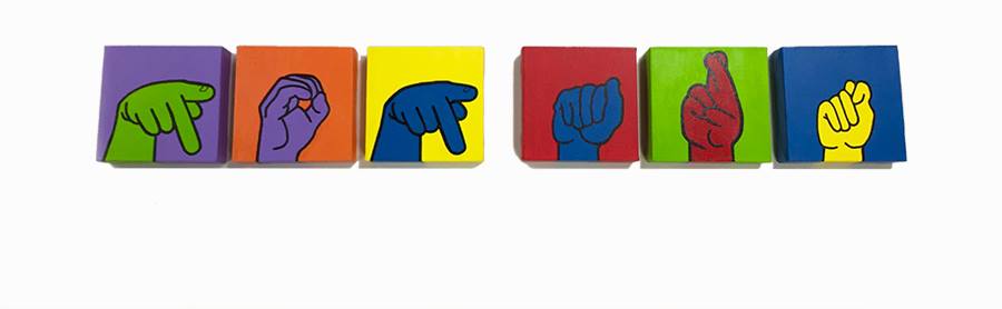 [Image description: Six different colored tiles, are lined up horizontally each with a different colored hand spelling out “pop art” in American Sign Language.]