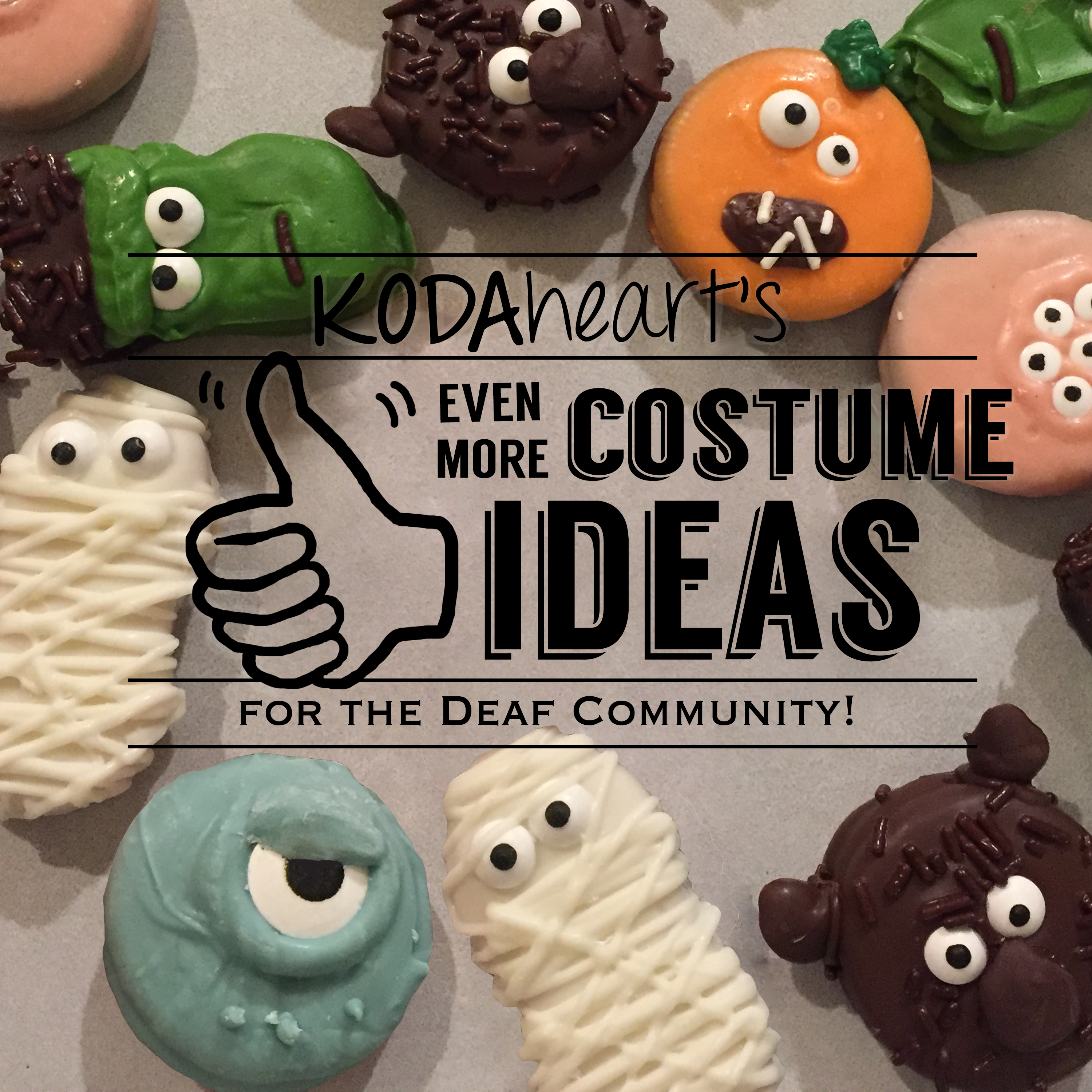 [Image Description: A thumb, outlined in black, signs “10” with accompanying text that reads: “KODAheart’s [10] Even More Costume Ideas Inspired by the Deaf Community!” In the background, a close-up photograph of various halloween decorated cookies including Frankenstein, werewolf, jack-o-lantern, and other various monsters.]